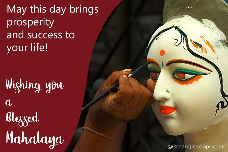 An image of goddess durga's closeup face written Blessed Mahalaya in English